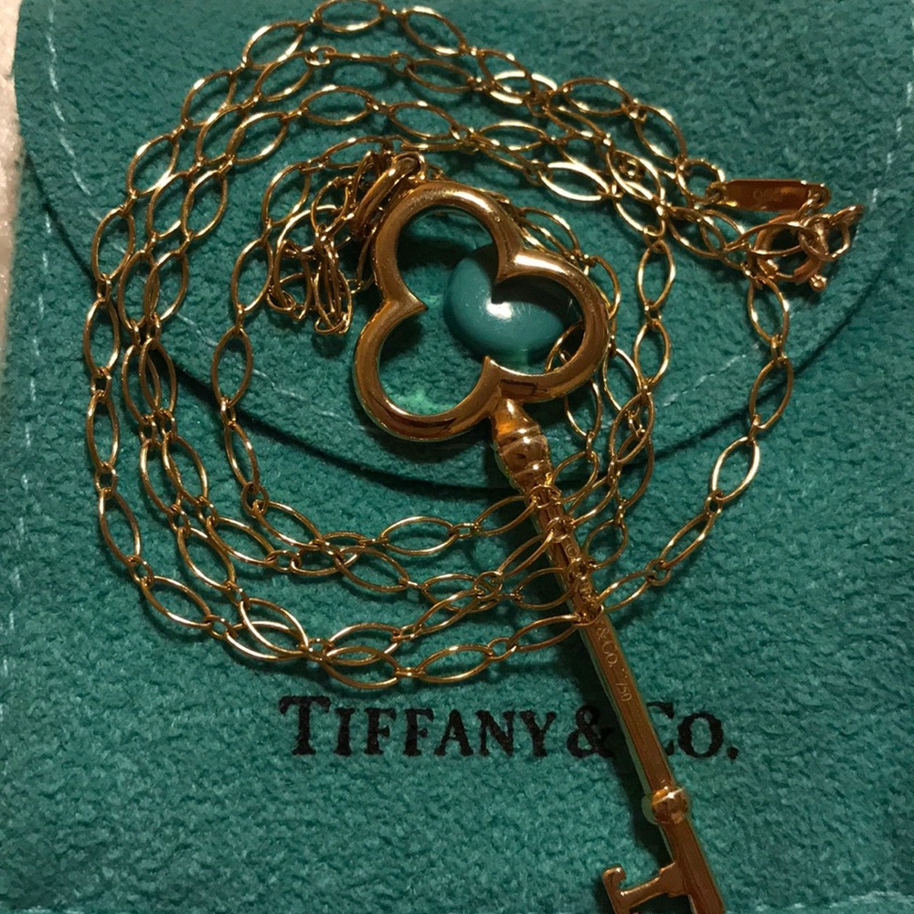 Tiffany & Co. 18K YG Trefoil Key Pendant & Chain.
